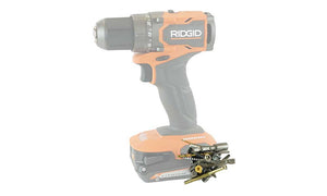 Orange and black Ridgid drill with screws and bits attached to the Second Set magnet, ensuring secure hardware storage during tasks.